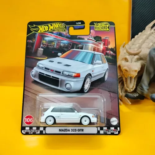 #106 - Mazda 323 GTR - New Casting - Image 1